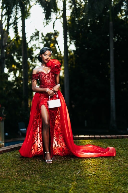 Outdoor portrait in a flowing red gown