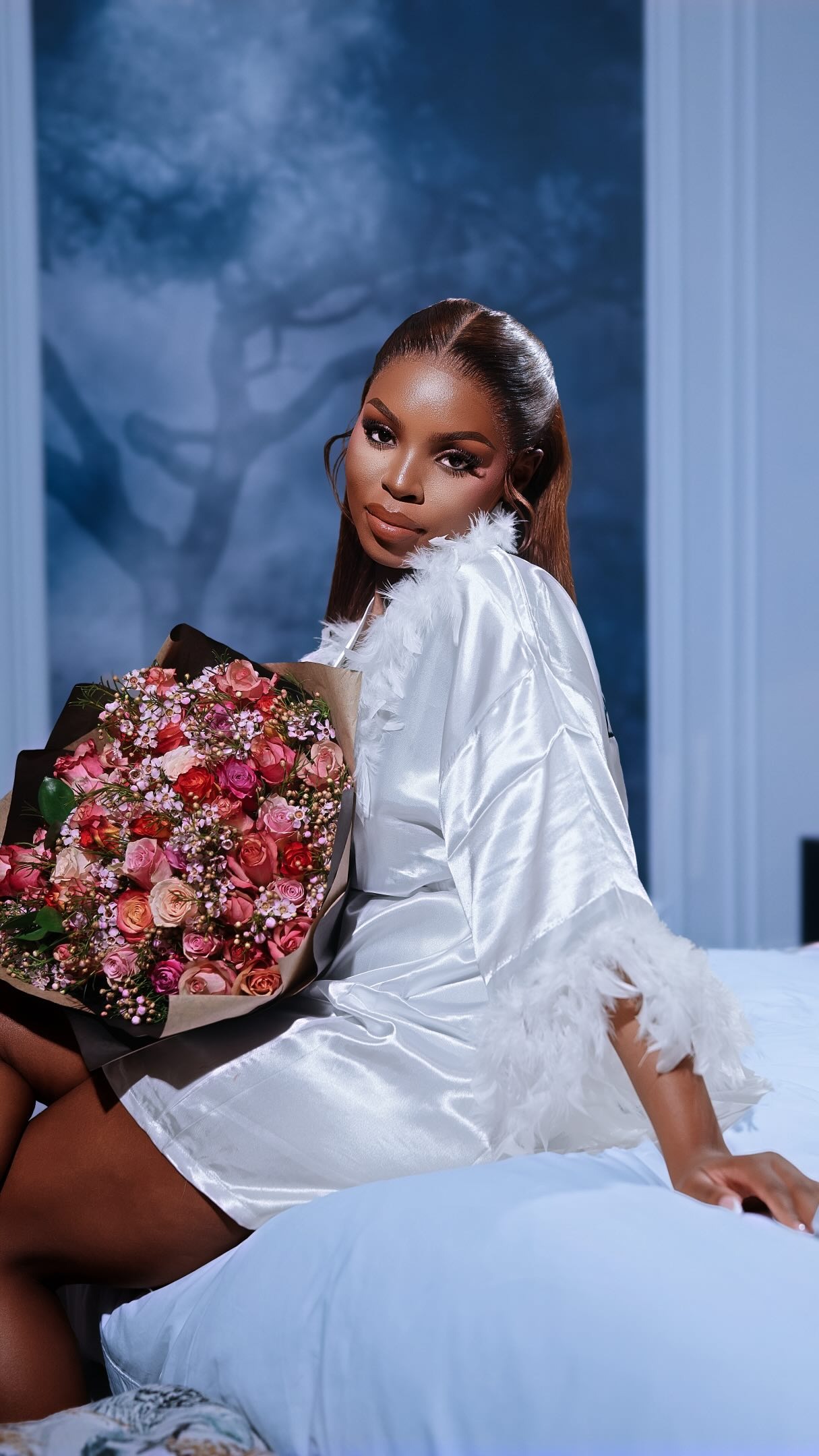 Bridal portrait with a bouquet of pink flowers